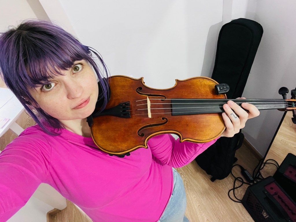 Violinista con vecinos